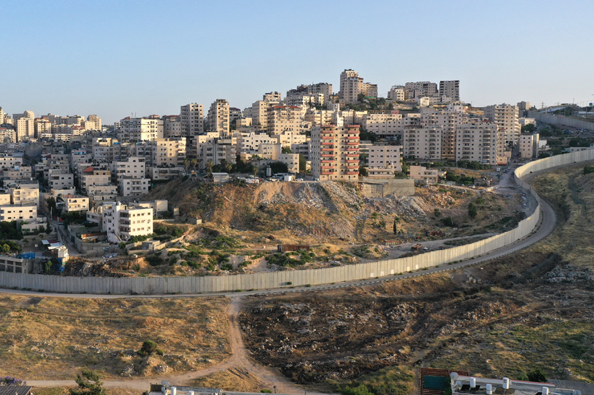 buildings with wall around them in Israel